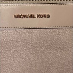 Michael Kors rose gold crossbody with built in wallet
